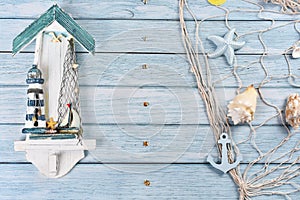 Summer holidays flat lay on blue board