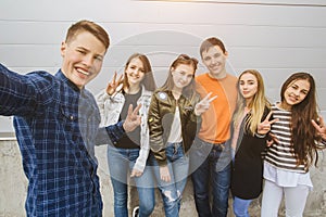 Summer holidays and teenage concept - group of smiling teenagers