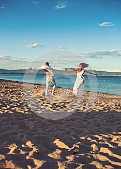 Summer holidays and travel vacation. Love relations of dancing couple enjoying summer day together. Couple in love dance