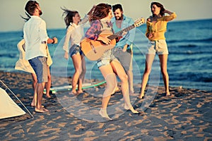 Summer, holidays, vacation, music, happy people concept - young
