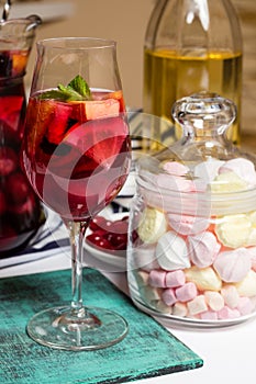 Summer home wine with fruits, sangria cocktail, murshmellows