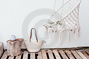 Summer hygge concept with hammock chair in the garden photo