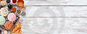 Summer ice cream bar above view side border over a rustic white wood banner background
