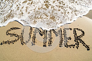 Summer inscription on beach
