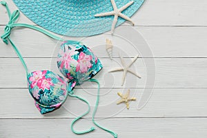 Summer items and accessories  traveler woman colorful bikini , camera go to travel plan holiday vacation in the beach