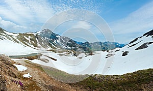 Summer (June) Alps mountain and winding road (view from Grossglockner High Alpine Road