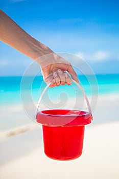 Summer kid's beach toys in the white sand