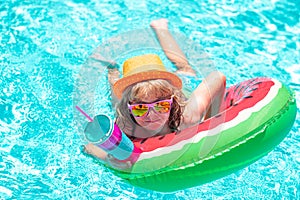 Summer kids vacation fun. Kids swimming pool. Summer vacation fun. Cute kid in swimming pool.