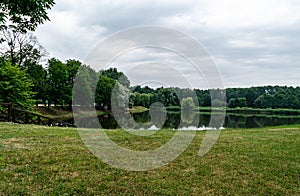 Summer landscape. Beautiful lake in the park. Natural background wallpaper postcard