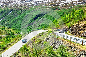 Summer landscape and cars of oldtimer rallye in Norway