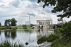 Summer landscape. The dam covers the bed of a small river