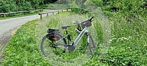 Summer landscape with an e-bike on the way