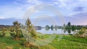 Summer landscape fast of the Ural river with the trees on the Bank of Russia, June
