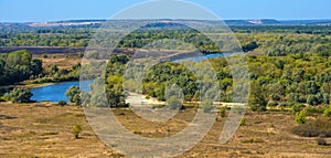 Summer landscape, field and bend of the  river