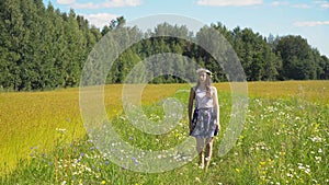 Summer landscape, girl, field of flax