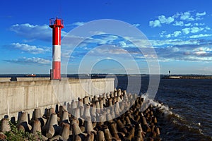 The lighthouse on the pier and breakwaters