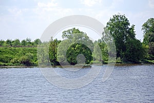 Summer landscape on the quiet lake