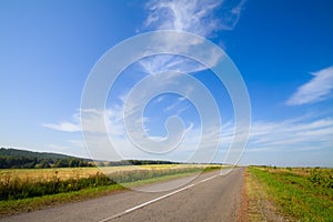 Summer landscape with rural road