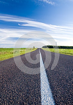 Summer landscape with rural road