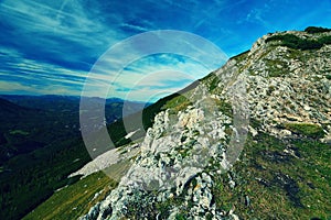 Summer landscape with sharp mountain peaks in Alps