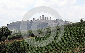 Summer landscape in Tuscany, hilltop town of San Gimignano, Italy