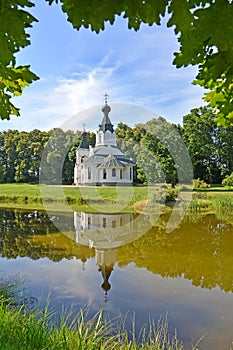 Summer landscape with a view of the Church of the Sovereign Icon of the Mother of God. Izobilnoe village, Kaliningrad region