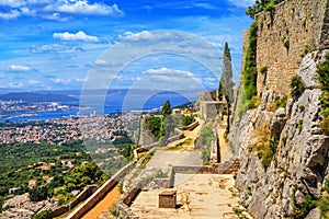 Summer landscape - view of the Klis Fortress and the city of Split
