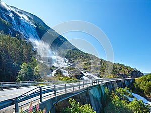 Summer Langfossen waterfall (Norway).