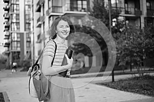 Summer lifestyle portrait of young stylish hipster woman smiling enjoy weekends
