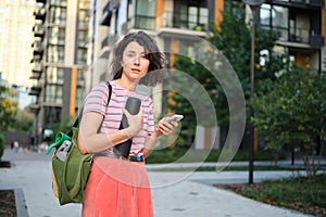 Summer lifestyle portrait of young stylish hipster woman smiling enjoy weekends