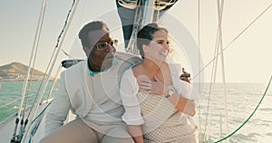 Summer, love and travel with a couple on a yacht together in celebration of an anniversary on a luxury cruise. Smile