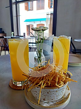 Summer lunch: truffle fries and orange juice