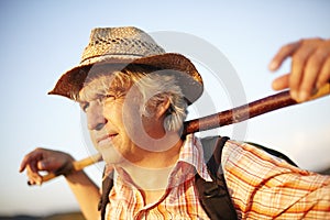 Summer meadow man hat Stick