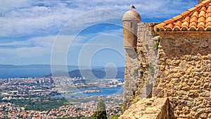 Summer mediterranean landscape - top view from the Klis Fortress on the city of Split