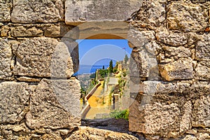 Summer mediterranean landscape - view from the loophole of the tower to the Klis Fortress near the city of Split