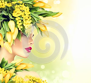 Summer model girl with nature flowers hairstyle