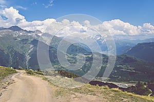 Summer mountain landscape near Mestia, Svaneti region, Georgia, Asia. Snowcapped mountains in the background. Blue sky