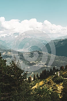 Summer mountain landscape near Mestia, Svaneti region, Georgia, Asia. Snowcapped mountains in the background. Blue sky