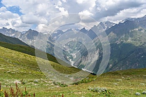 Summer mountain landscape in Svaneti region, Georgia, Asia. Snowcapped mountains in the background, Caucasus mountain