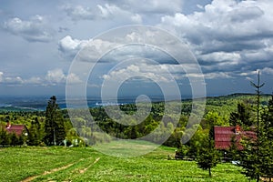 Summer mountains green grass and blue sky landscape