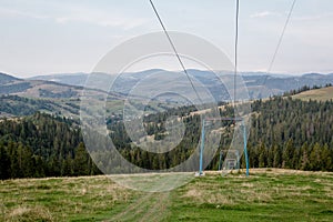 Summer mountains landscape with cableway