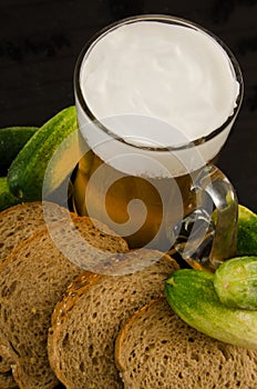 Summer. Mug of beer and bread