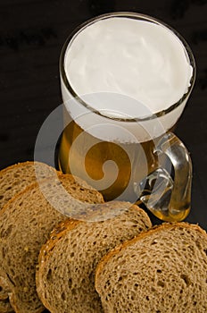 Summer. Mug of beer and bread