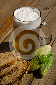 Summer. Mug of beer and bread