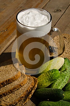 Summer. Mug of beer and bread