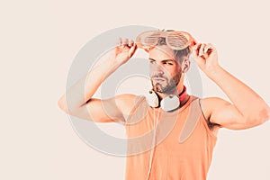 Summer music chart. Guy unshaven face listening summer music. Party concept. Dj boy. Popular summer track list photo