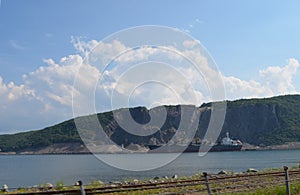 Summer in Nova Scotia: Porcupine Mountain Quarry in Aulds Cove on the Shore of Strait of Canso as seen from Canso Causeway