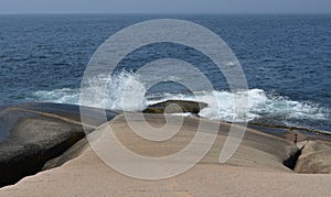 Summer in Nova Scotia: Rocks of Peggy`s Cove as Fog Approaches