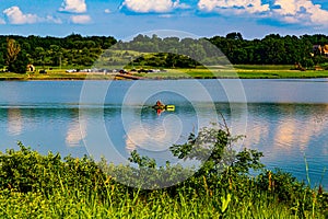 Summer in Omaha, boat ramp, parking lot and canoe on the lake at Ed Zorinsky Lake Park Omaha NE