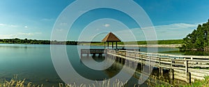 Summer in Omaha, Panorama Pier or gazebo with Reflection on the lake  Ed Zorinsky lake park, Omaha, Nebraska, USA